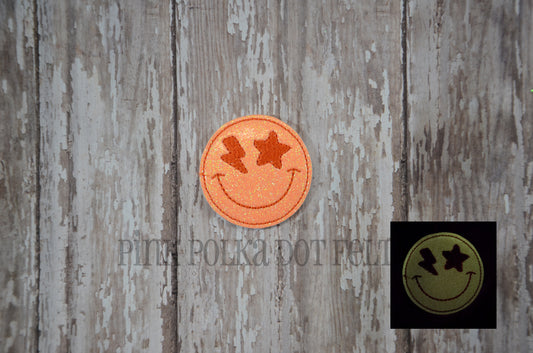 Glow in the dark Smiley with bolt/star eyes