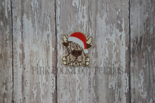 Highland Cow with Santa Hat