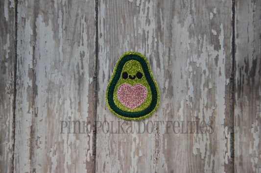 Avocado with pink heart