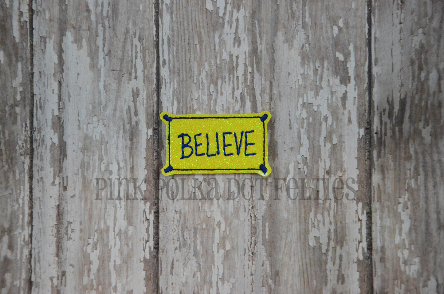 Lasso Believe Sign