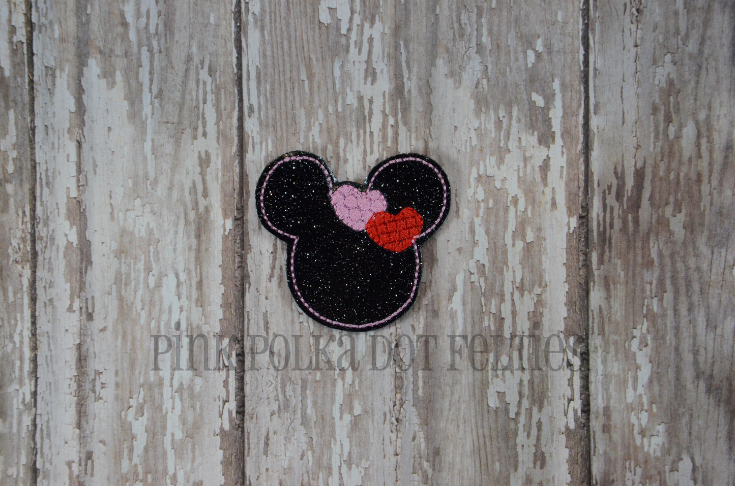 Mouse head with hearts